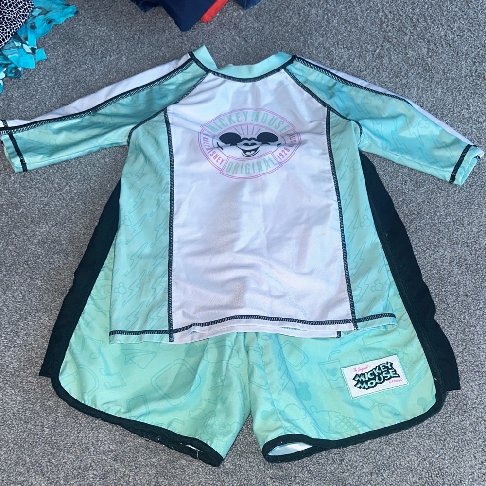 Disney brand swim trunks and rash guard